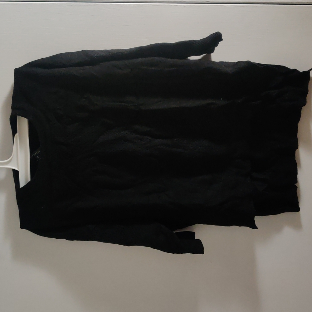 Portman's Black sweater